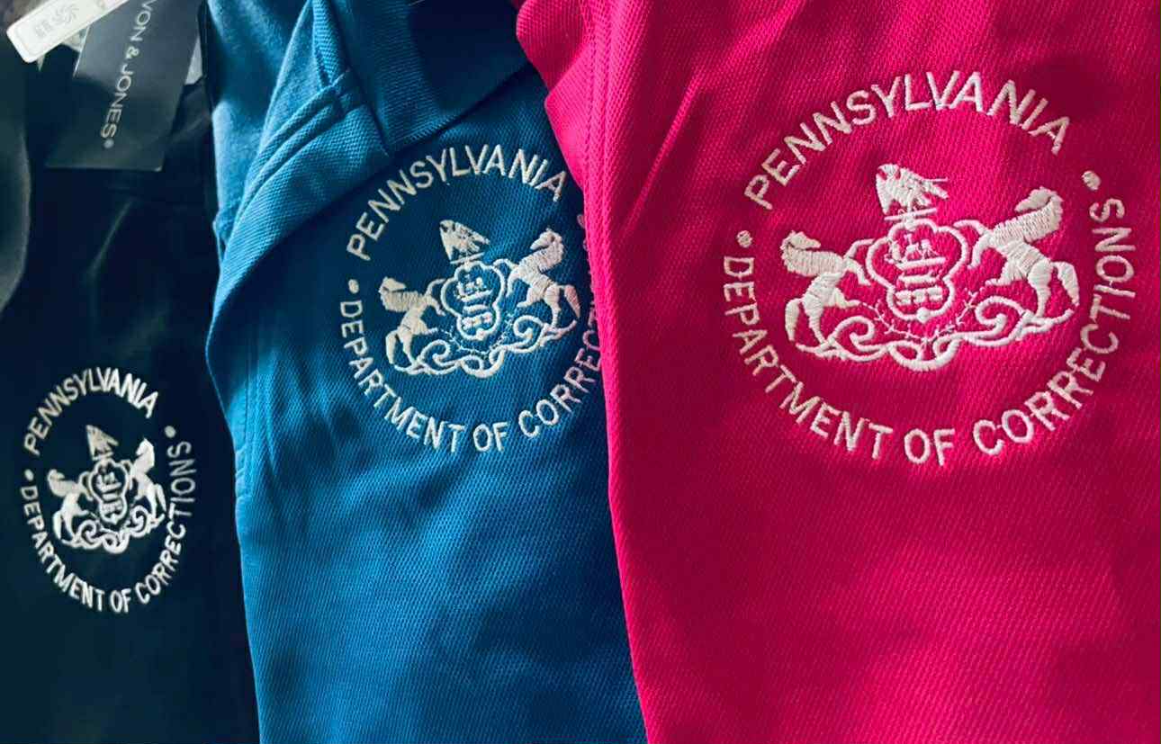 Ladies' Luxury Performance Polo with Embroidered Department of Corrections Logos (Various Colors)